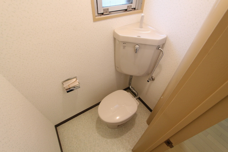 Toilet. Image Photos. Photograph is of a separate room.