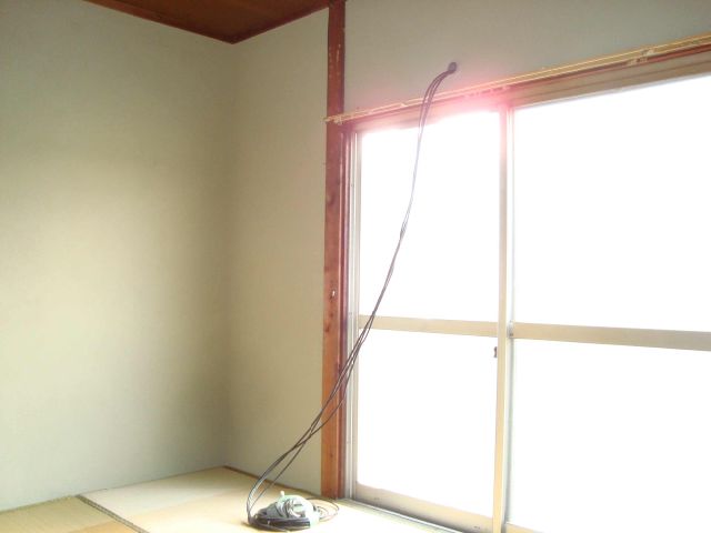 Living and room. It contains the warm sunlight. 