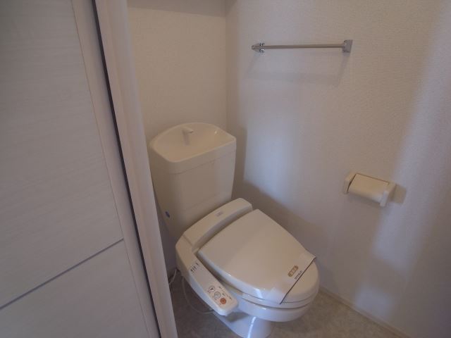 Toilet. Washlet is with