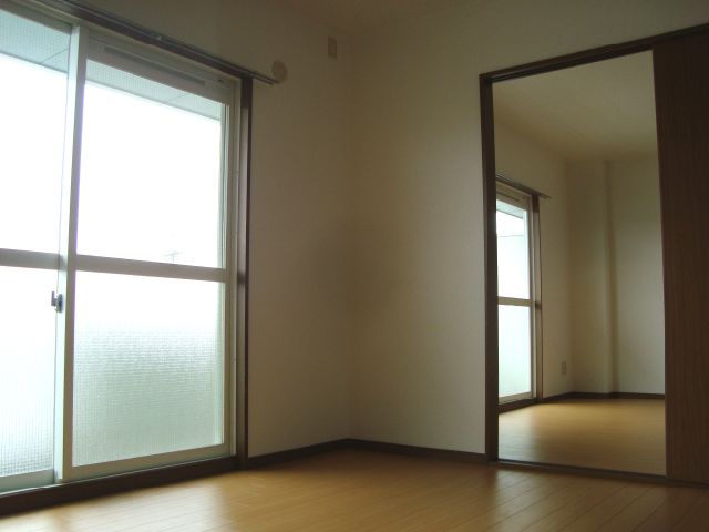 Living and room. Day is good on the south-facing