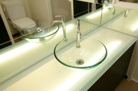 Washroom. Basin is a stylish glass bowl