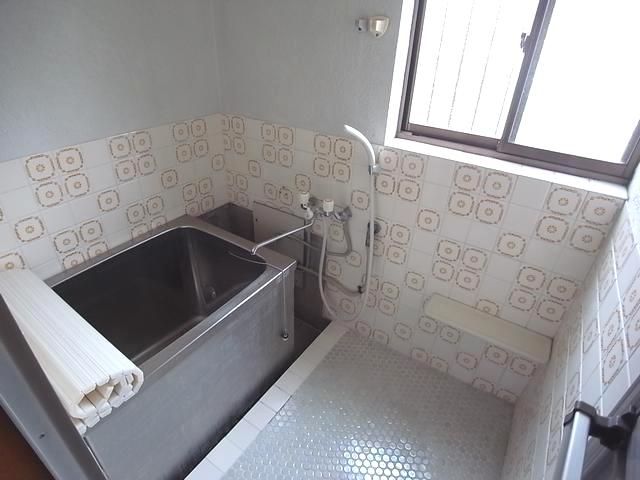 Bath. It is with a hot water supply equipment.