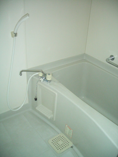 Bath. There is a window in the bathroom