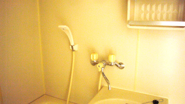 Bath. With rack in the bathroom.