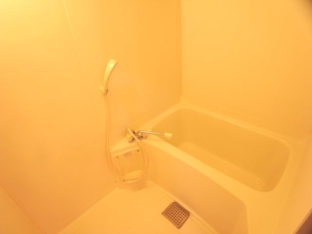 Bath. Bathroom was a white tones.