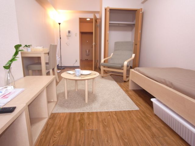 Living and room. It is equipped with stylish furniture appliances. 