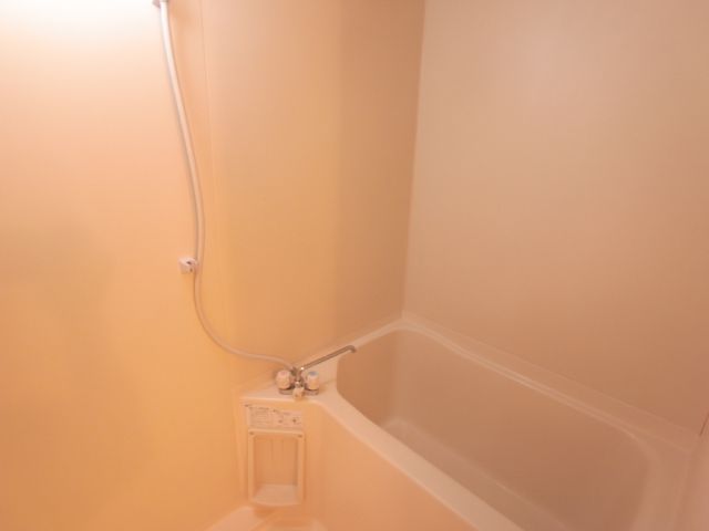 Bath. It is a bathroom with a space!