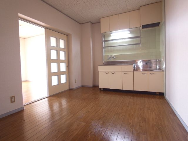 Living and room. You can use clean put the refrigerator in the kitchen next to