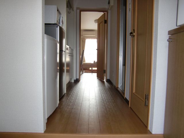 Entrance. Plenty of cupboard storage