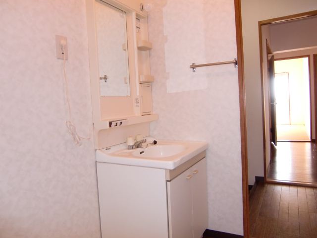 Washroom. It is bright and there is a window