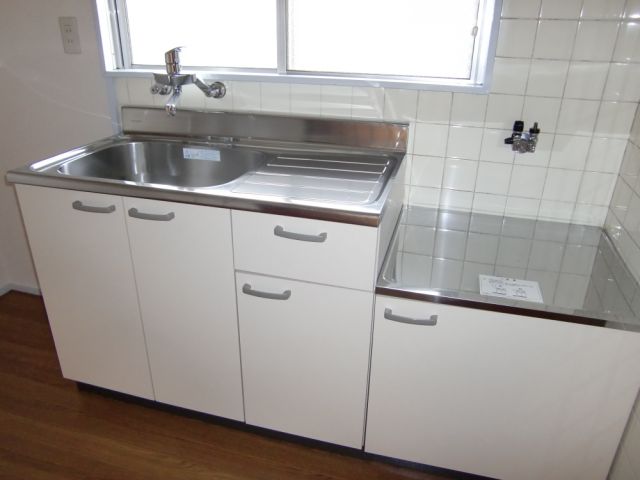Kitchen. Gas stove is installed type