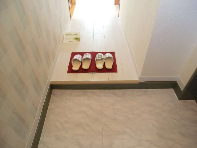 Entrance. Sunny bright veranda