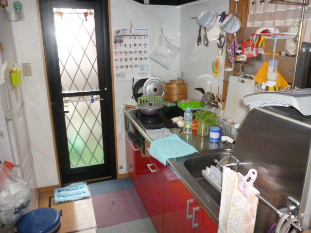 Kitchen. System kitchen with a back door