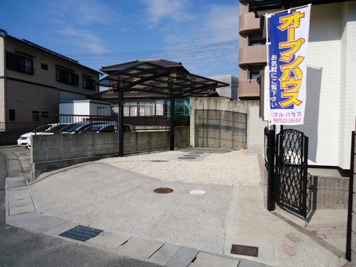 Parking lot. A total of three OK with a single carport