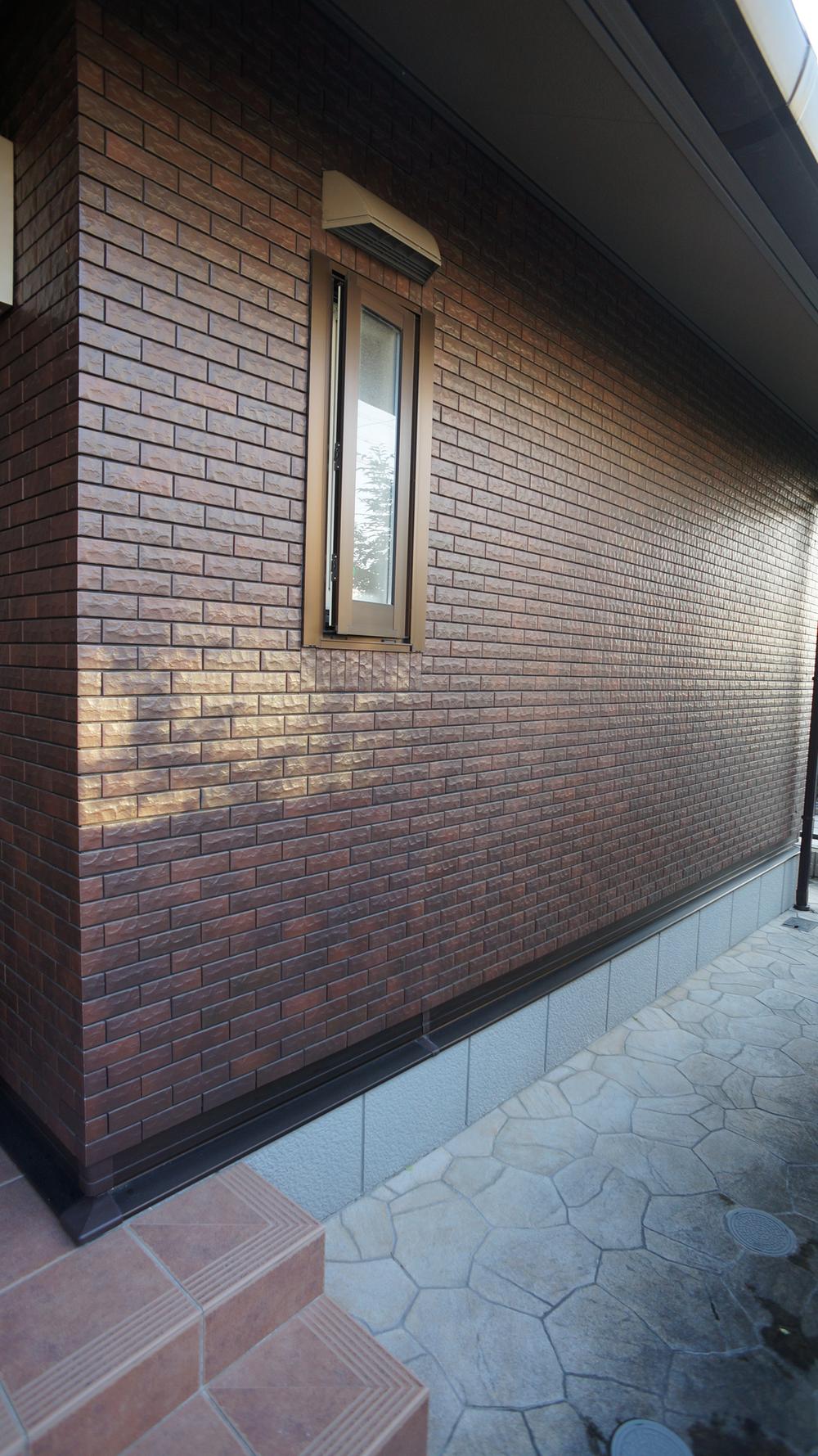 Other local. Kira Tech tiled outer wall
