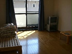 Living and room. It is a photograph of the same type of room.