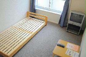 Living and room. It is a photograph of the same type of room.