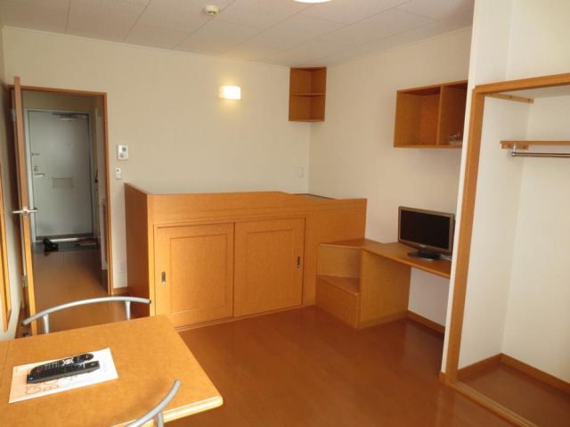 Living and room. State of 1K room with a loft. 