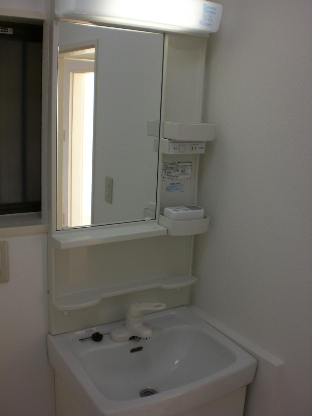 Wash basin, toilet. New renovation already