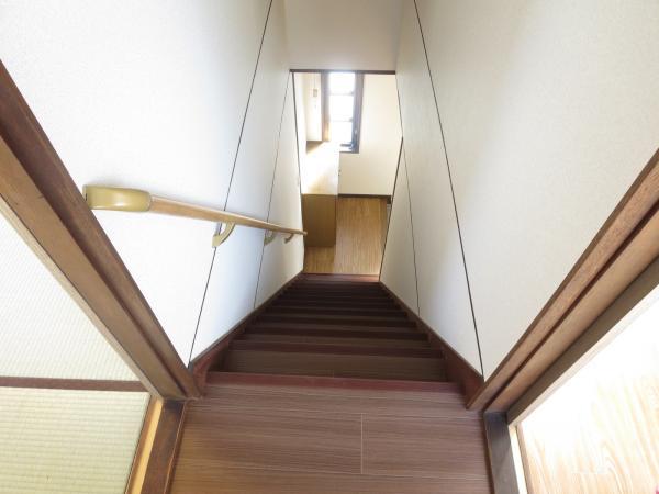 Other local. Second floor staircase has decided cross re-covering.