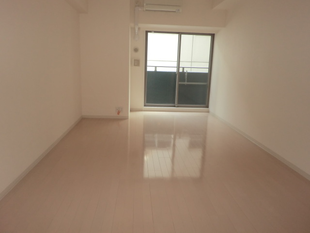 Living and room. Because the floor is white rooms are wide