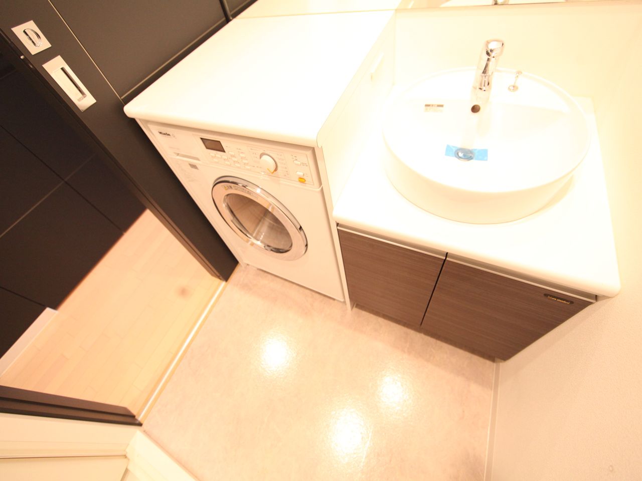 Washroom. It has spacious dressing room (with separate wash basin)