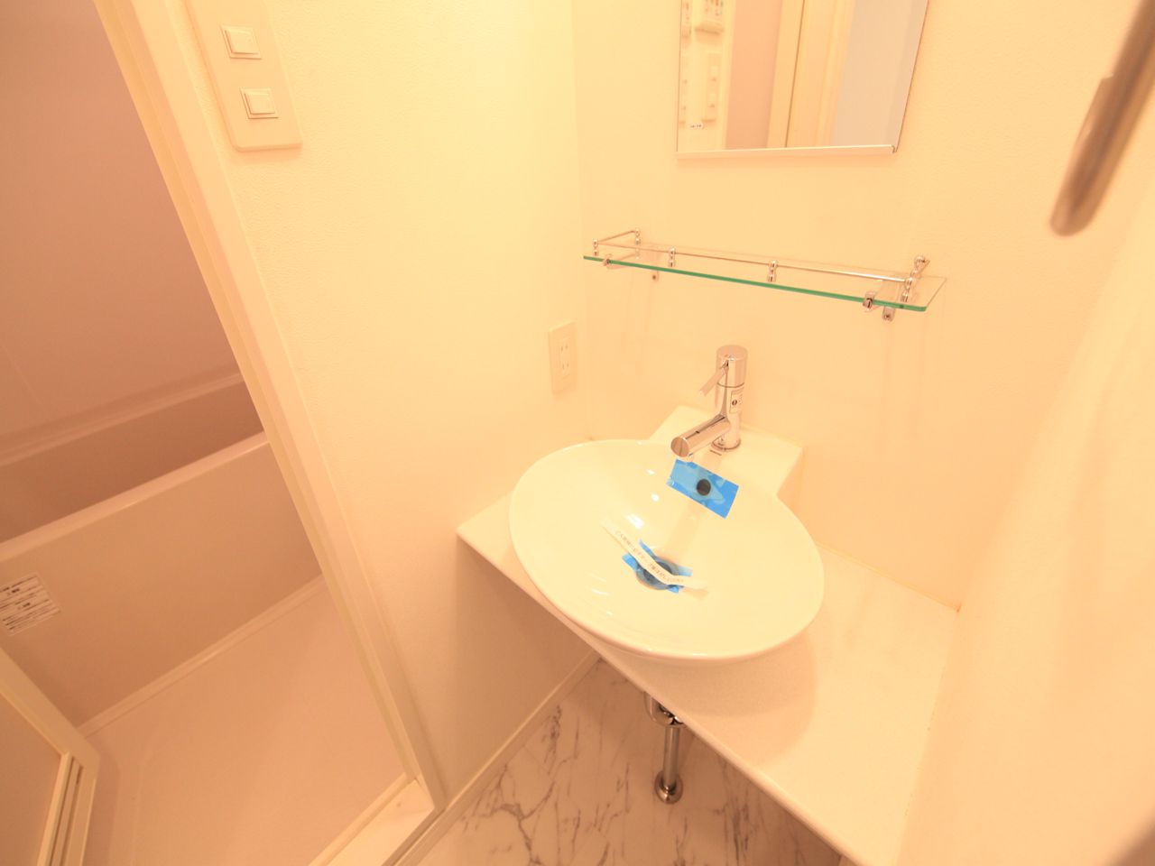 Washroom. Stylish independent wash basin equipped