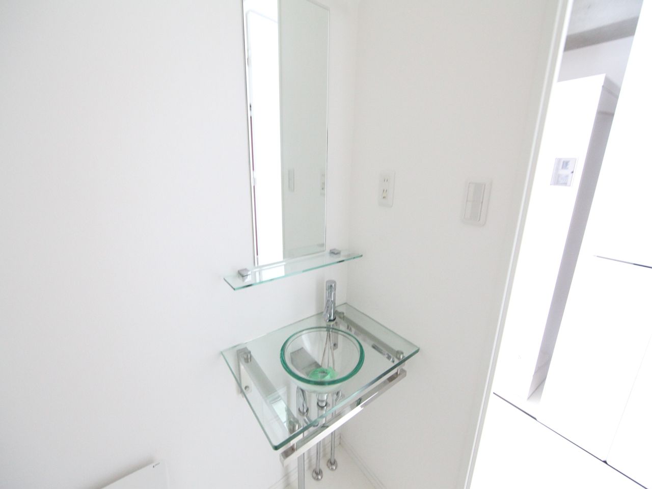 Washroom. Stylish washbasin Toilet with warm water washing toilet seat