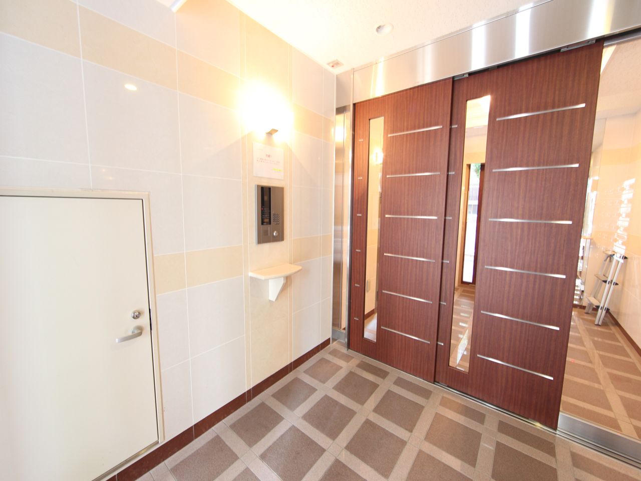 Entrance. surveillance camera With Secom (peace of mind security) auto-lock