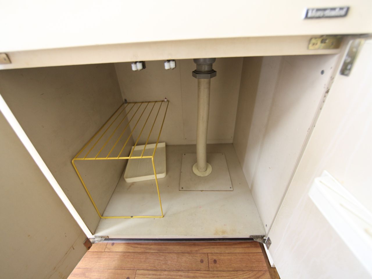 Receipt. Storage under the kitchen