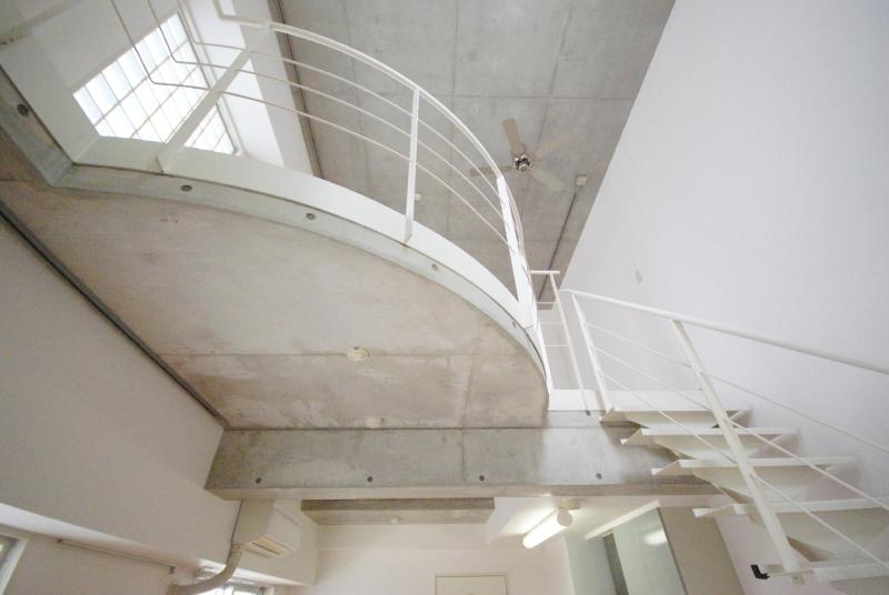 Other room space. Stairs going up to the loft