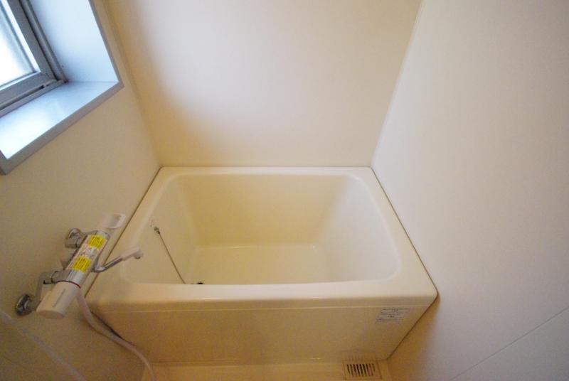 Bath. It is a bus that is attached window