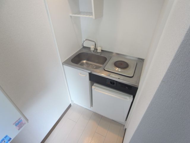 Kitchen. It comes with bite electric stove.