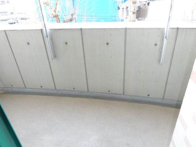 Balcony. It is the spread of the veranda.