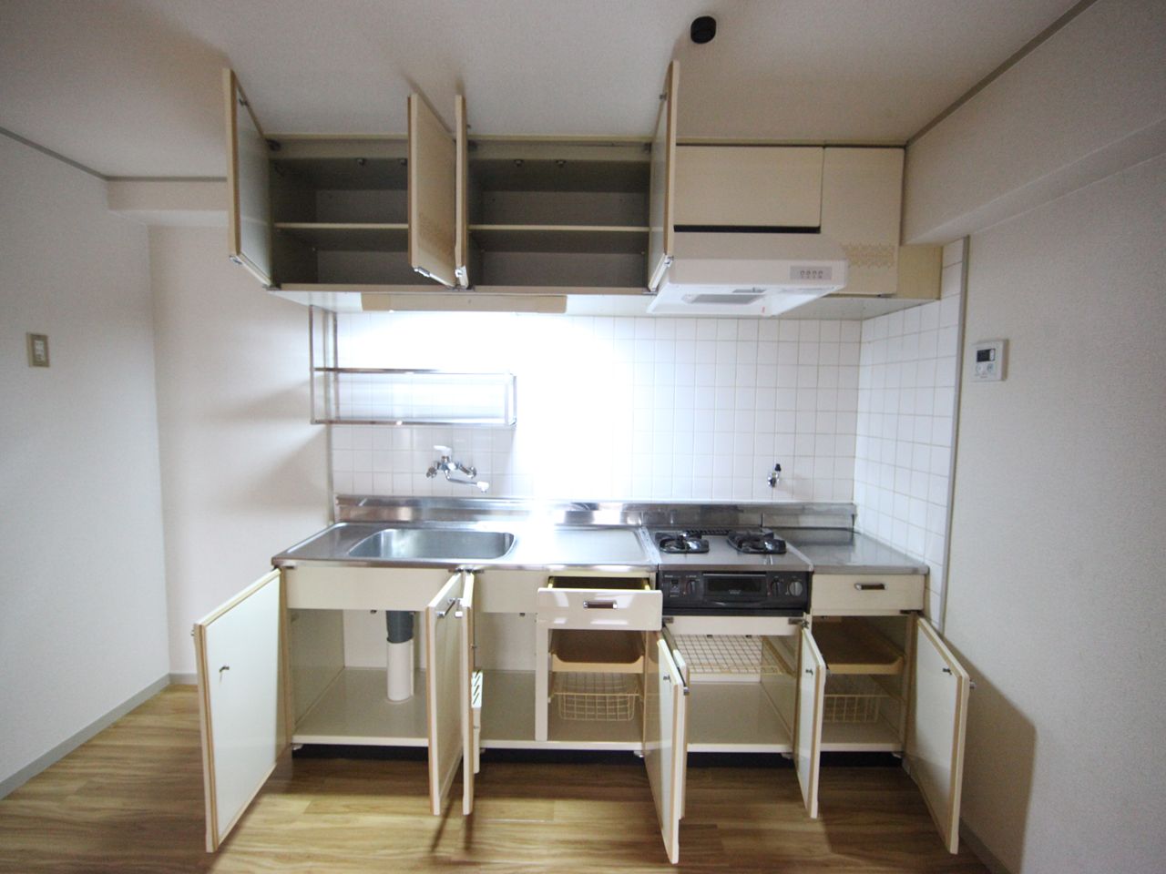 Kitchen. Kitchen two-burner gas stove with grill Storage rich have