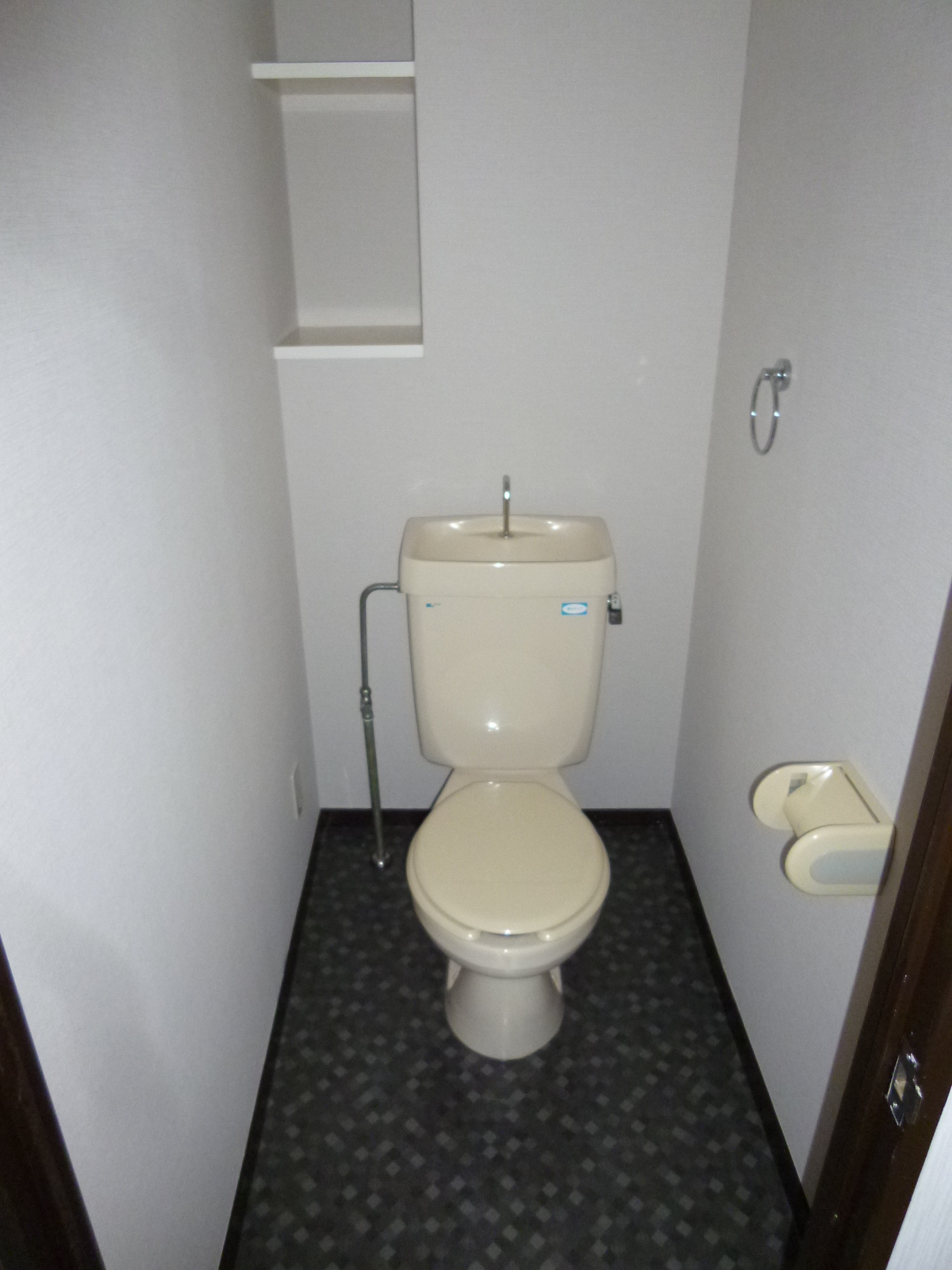 Toilet. Storage is a shelf with toilet ☆