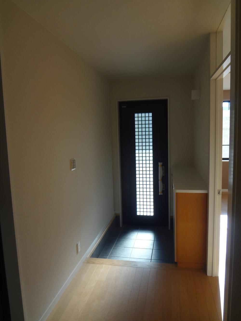 Entrance. South-facing entrance