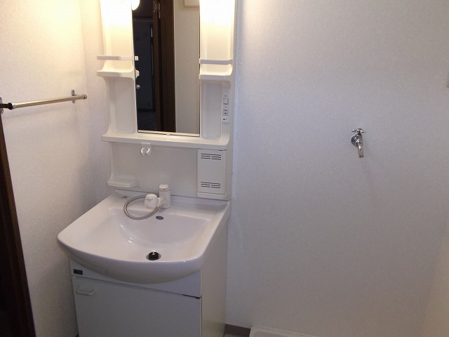 Washroom. Shampoo is Dresser.