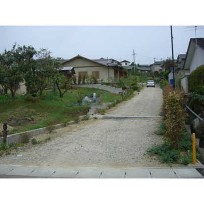 Local appearance photo. Exterior (subject property is left behind. )