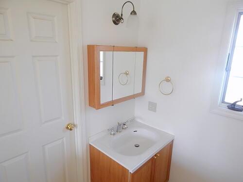 Wash basin, toilet. Bathroom vanity