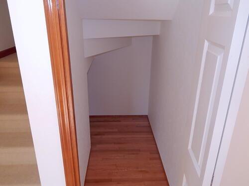 Receipt. Stairs under storage