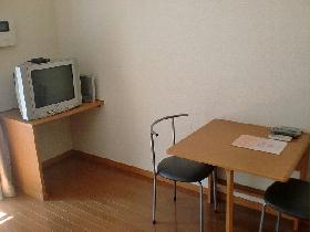 Living and room. It is a photograph of the same type of room