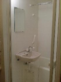 Bath. It is a photograph of the same type of room