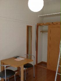 Living and room. It is a photograph of the same type of room