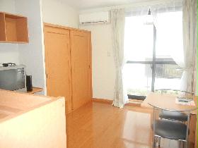 Living and room. It is a photograph of the same type of room.