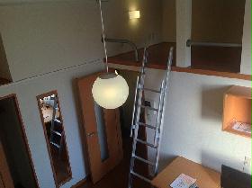 Living and room. It is a photograph of the same type of room. 