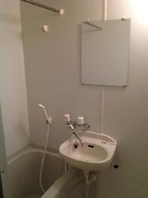 Bath. It is a photograph of the same type of room. 