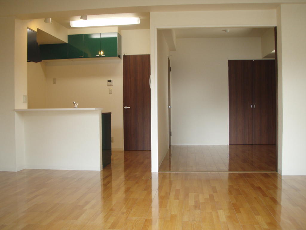Kitchen. There is face-to-face kitchen back hanging cupboard storage
