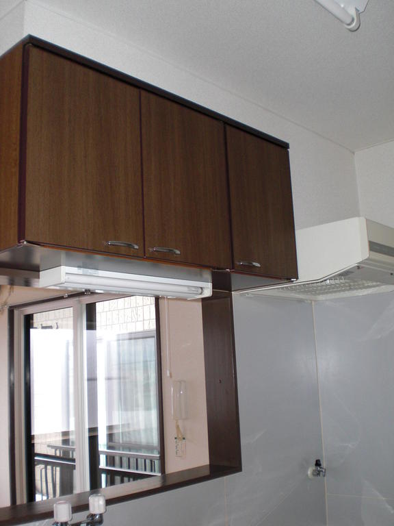 Kitchen. There is also a hanging cupboard