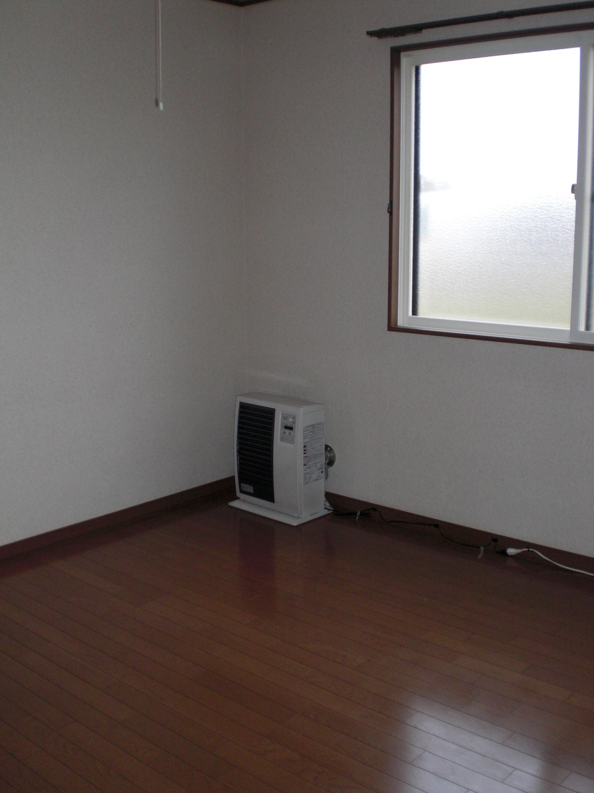 Living and room. With FF stove